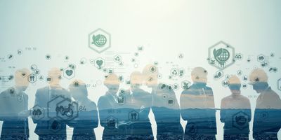 Group of business people with floating icons representing different sustainability themes