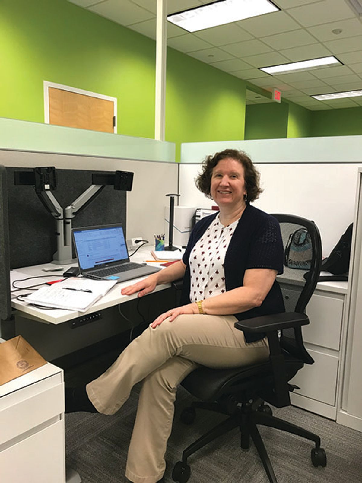 Photo of Stephanie Mabry, PhD, sitting at her desk. Photo of Stephanie Mabry, PhD, sitting at her desk.