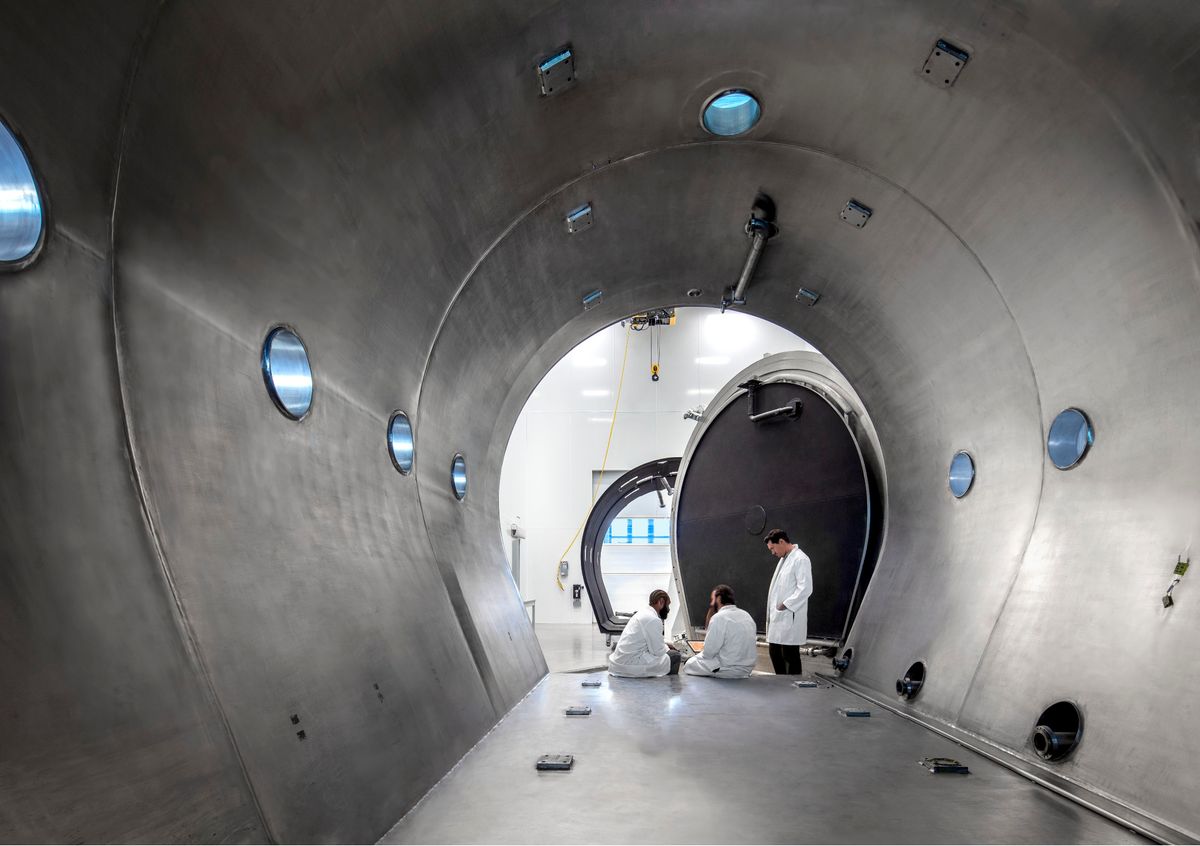 Scientists in U of Arizona thermal vacuum chamber Scientists in U of Arizona thermal vacuum chamber